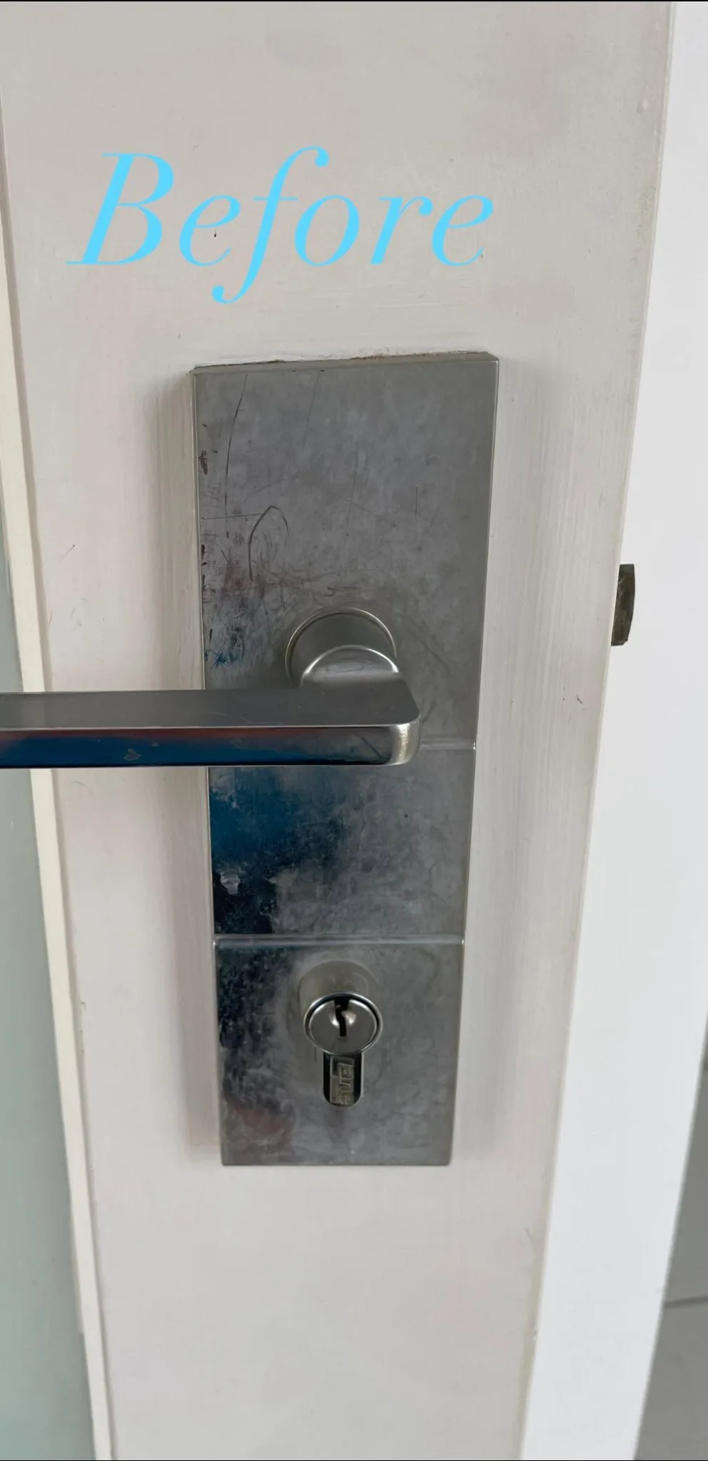 Marked door-handle backplate before cleaning